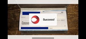 Check photo capture screen showing a "Success!" overlay message after scanning the check.