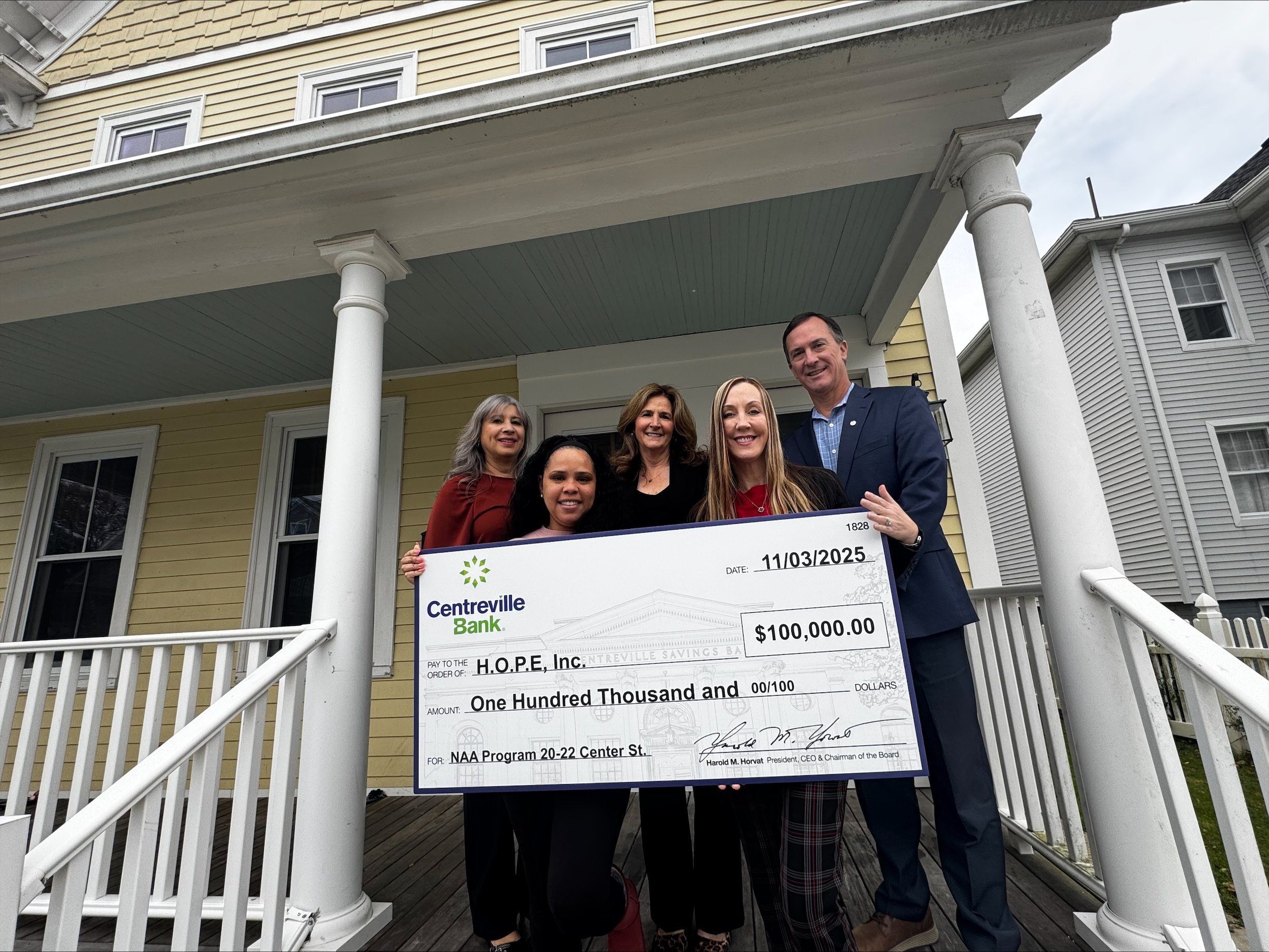Centreville Bank representatives presenting a $100,000 check for affordable housing investment