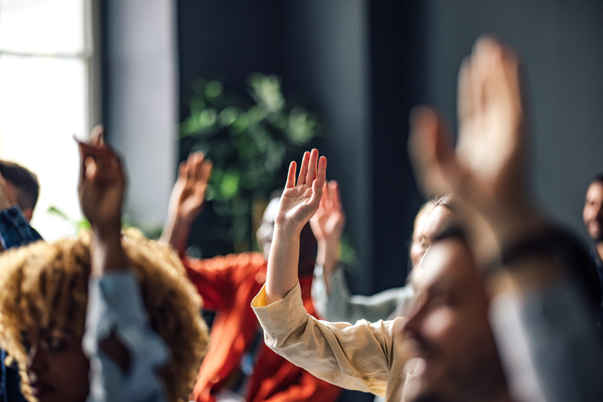 Students raising their hands